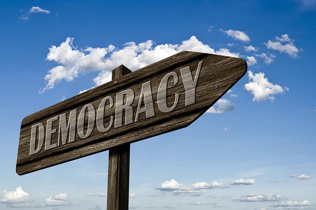 democracy-signpost-sign-direction