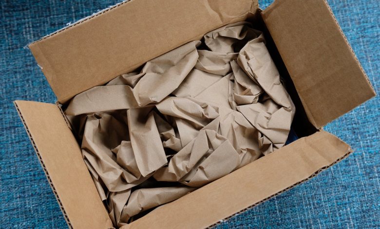 cardboard box with packing paper inside